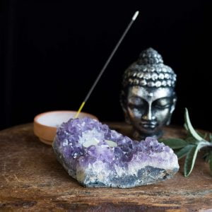 natural amethyst cluster with hole drilled for tea light candle