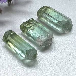 uncut green and blue tourmaline gemstones