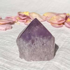 Amethyst part polished six sided tip and natural bottom half