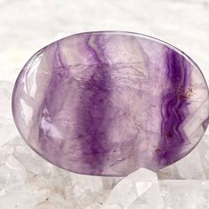 Fluorite soapstone with width ways purple and clear chevron banding