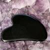 black obsidian gua sha crystal facial massage tool beauty treatment