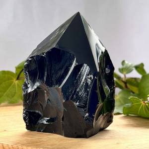 Obsidian - part polished with a six sided tip and natural bottom half