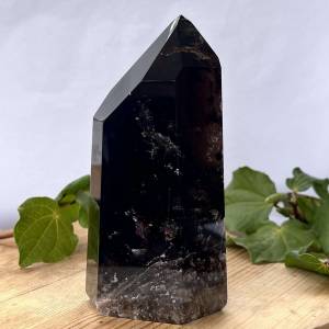 Smokey quartz tower, asymmetrical, dark but with good clarity