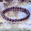 amethyst bracelet made with 6mm beads natural purple crystal on purple elastic