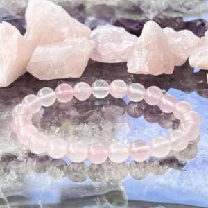 rose quartz bracelet 8mm sphere cut beads on pale pink elastic natural pink crystal