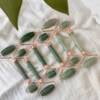 Aventurine green quartz massage roller with 'rose gold' fittings