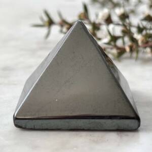 Hematite pyramid, shiny and polished smooth