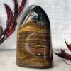 polished tiger eye freeform brown, golden and ochre horizontal banding with flat base to stand upright