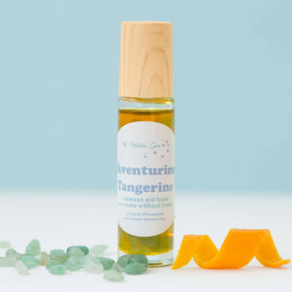 aventurine and tangerine positive affirmation oil, glass bottle, crystal roller ball, full of small polished green aventurine, essential oil and sweet almond oil