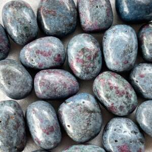 ruby kyanite tumblestones, mid blue kyanite each with masses of tiny red rubies