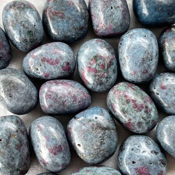ruby kyanite tumblestones, mid blue kyanite each with masses of tiny red rubies