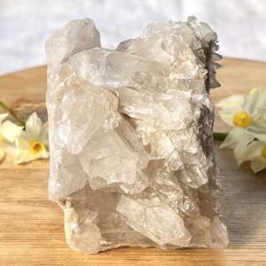 quartz cluster with chunky points all growing inwards from the two rock sides