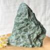 sparkling green natural fuchsite with a cut base to stand upright