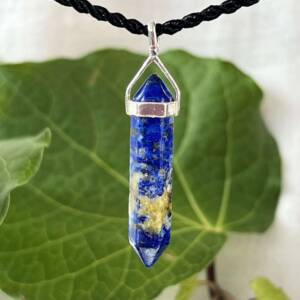 double terminated lapis lazuli pendant set in silver with six sides