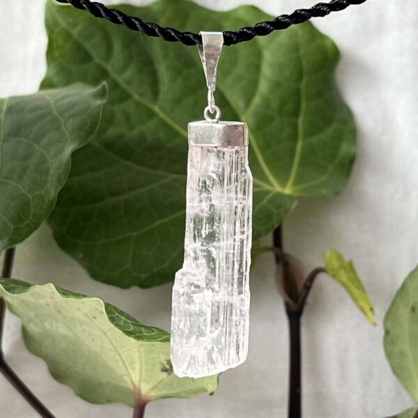 natural kunzite pendant with a silver setting