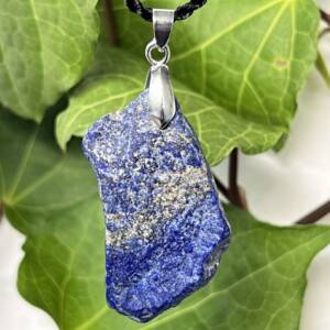 natural lapis lazuli pendant set with a simple clasp to allow it to swing