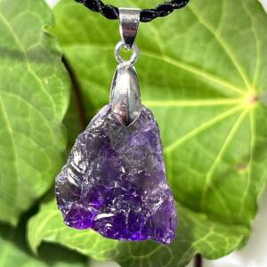 natural raw amethyst pendant set on simple swing metal clasp and link