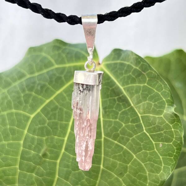 pink tourmaline pendant with a silver cap setting