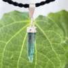 natural blue tourmaline pendant with silver cap and link