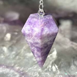 large lilac and white lepidolite pendulum on a white metal chain and ring