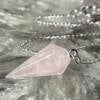 rose quartz pendulum pale pink six sides and white metal chain and ring at the top