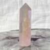 angel aura rose quartz tower with six sides and facets to create the tip