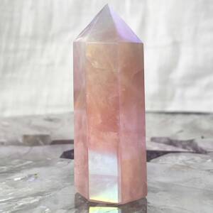 angel aura rose quartz tower with six sides, faceted tip and colourful metallic sheen