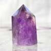 amethyst tower with six sides and faceted point