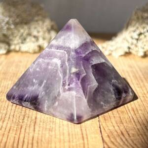 chevron amethyst pyramid with a complex range of white banding throughout the deep purple quartz