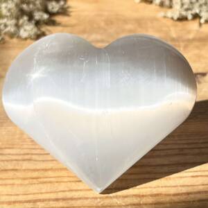 white selenite heart cut and polished a very shiny