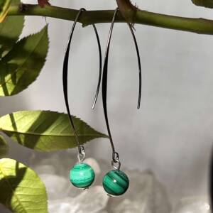 malachite earrings made with a silver coloured metal hook.