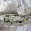 prehnite bracelet with 8 mm beads on a green elastic