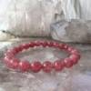 strawberry quartz bracelet of 8 mm spherical beads on a pink elastic