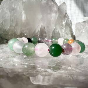 mixed quartz bead bracelet includes mainly aventurine and rose quartz with amethyst round 8 mm beads on elastic
