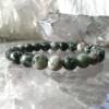 matt green agate bracelet with a mix of greens and white natural agate making each 8 mm bead