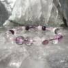 rose quartz and amethyst bracelet made with 7 mm round beads on pink elastic