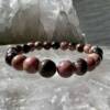 rhodonite bracelet with 8 mm beads of this pink and black crystal