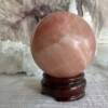 rose calcite sphere pink crystal ball wooden stand sold separately