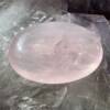 rose quartz soapstone, a naturally pink crystal shaped to resemble a bar of soap, meditation tool