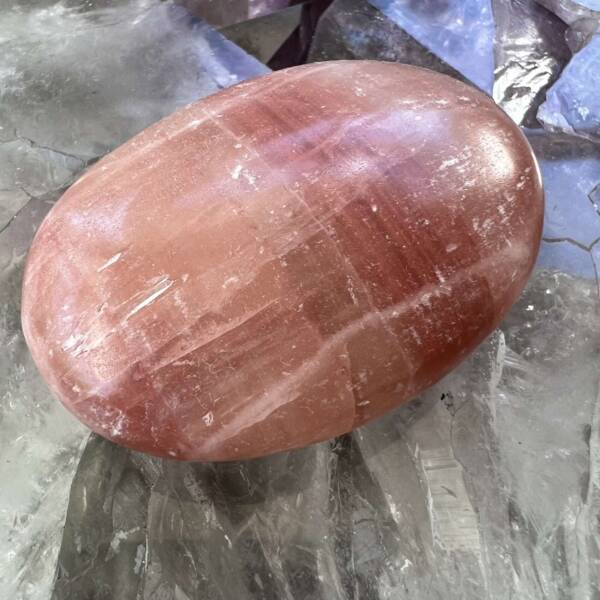 rose calcite soapstone hand carved and polished crystal to hold for meditation