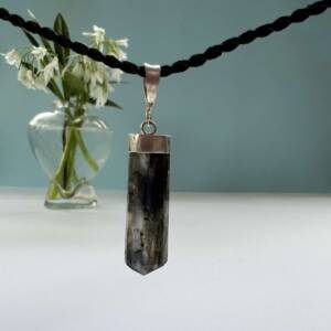 labradorite pendant with six sides set in silver natural mineral cut and polished