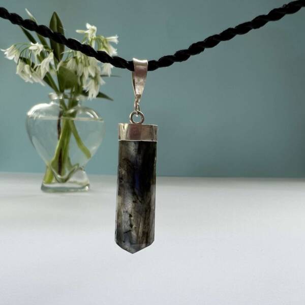 labradorite pendant with six sides set in silver natural mineral cut and polished