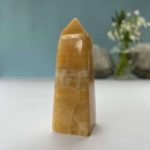 orange calcite obelisk