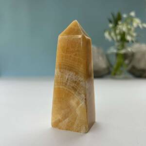 orange calcite obelisk polished crystal