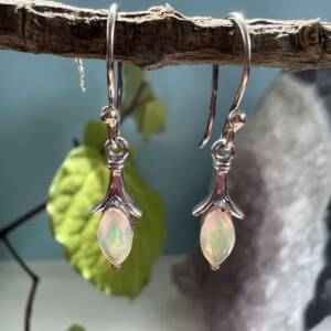 facet cut opal earrings solid silver setting good clarity and opalescence