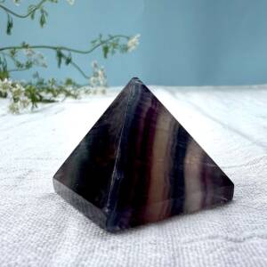 fluorite pyramid with purple, blue and clear banding typical of this crystal