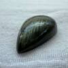 labradorite cabochon gemstone green and gold feldspar