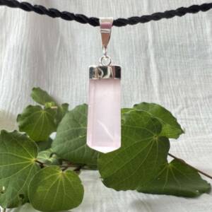 rose quartz pendant set with silver plate natural pink crystal with a six sided asymmetric shape the hidden gem