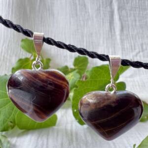 Heart shaped chocolate calcite pendants simply shaped and polished with a silver link