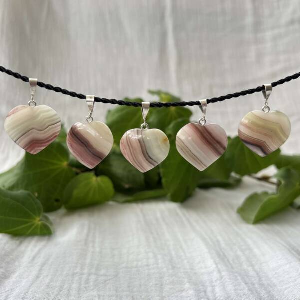 Heart shaped banded calcite pendants